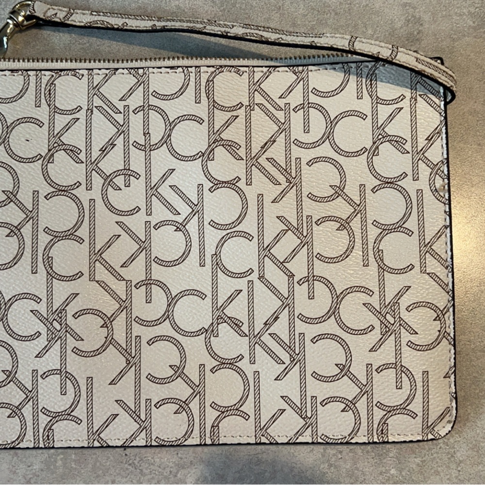 Calvin Klein Signature Monogram Zip Clutch Wristlet